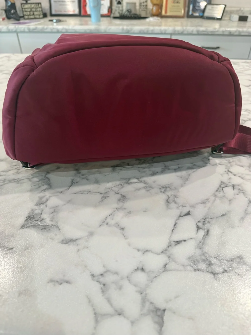 Tumi Burgundy nylon travel Backpack with several pockets